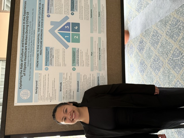 Bea with the PCH study working poster at the UCLA conference