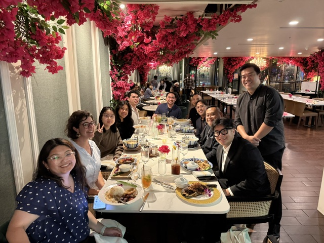 The TenJ Lab celebrating together at dinner during WIN 2026
