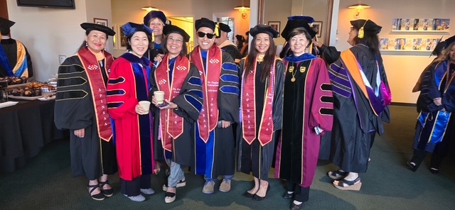 UCLA School of Nursing faculty colleagues at the 2026 commencement
