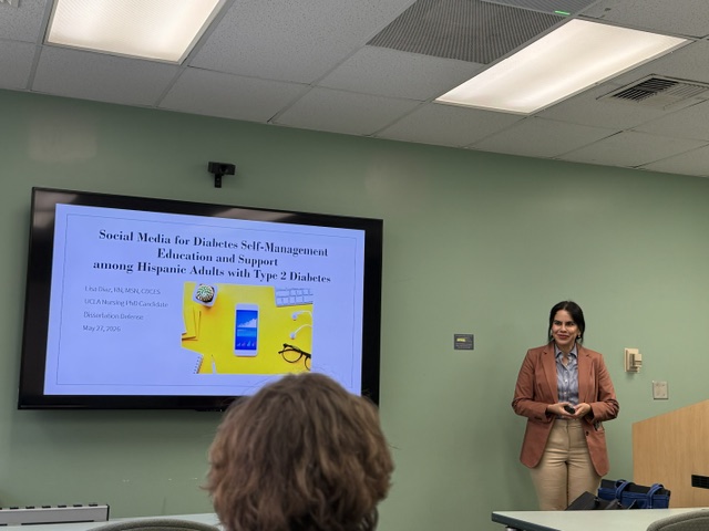 Lisa Diaz, PhD, RN, after successfully defending her dissertation