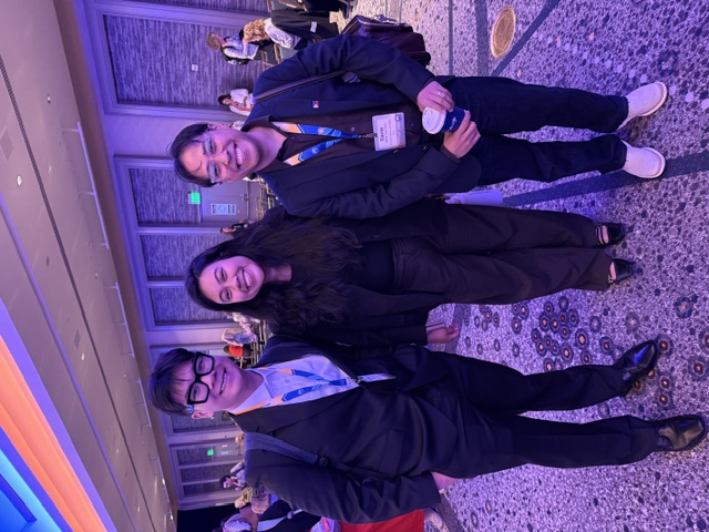 Michael, Sorina, and Dr. Tolentino at the conference.
