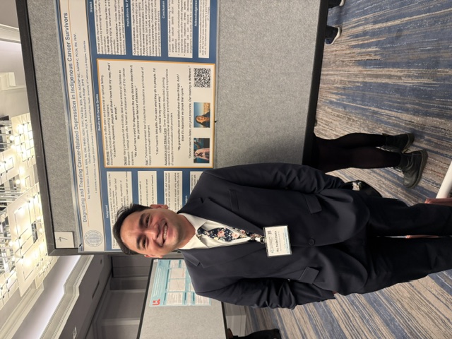 Paolo presenting his poster at the SBSM Annual Meeting
