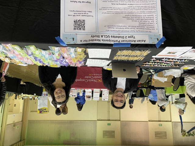 Paolo and Sorina recruiting study participants at the Philippine Nurses Association celebration