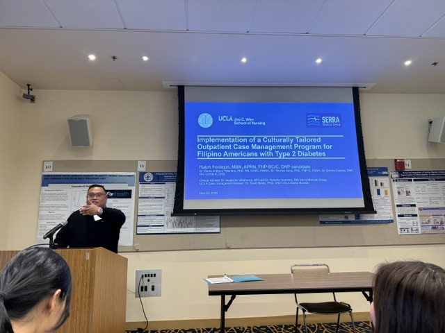 Ralph presenting his DNP project at the conference